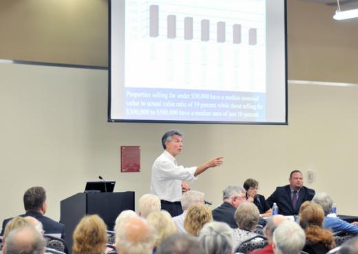 Founder of DMS Speaks at Forum on County Reassessment
